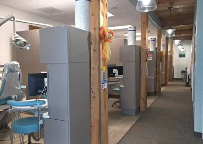 Cibola Dental treatment hallway with open operatories and dental chairs
